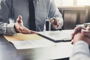 close-up of lawyer's hands - meeting with client