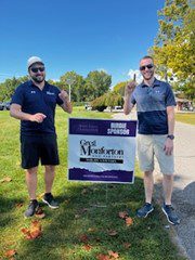 Greg Monforton & Partner's Cory Simard and Frank PIazza teeing off in support of the BIAWE annual golf tournament