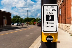 Close up of a pedestrian traffic sign in Ontario