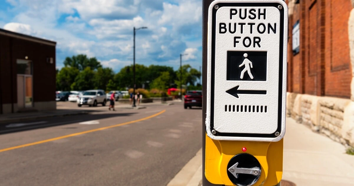 Close up of a pedestrian traffic sign in Ontario